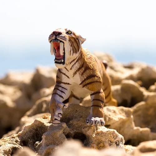 Safari Ltd. Smilodon Figurine - 4" Sabre-Toothed Tiger Educational Toy for Kids 3+ | Realistic Dinosaur Model thumbnail 2