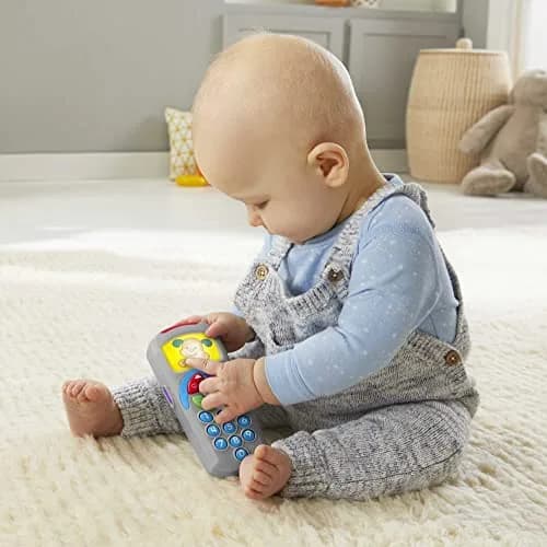 Fisher-Price Laugh & Learn Puppy's Remote Toy | 1 Count (1 Unit) | Music & Lights for Infants 6+ Months thumbnail 2