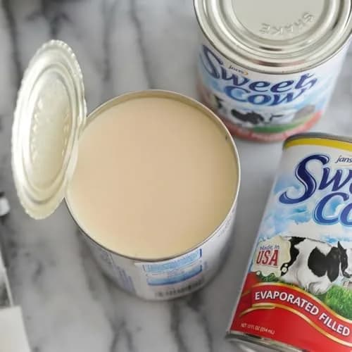 Jans Sweet Cow Evaporated Dairy Milk 164.4 ml (13.7 Fl Oz) Pack of 12 | Rich & Creamy Taste for Cooking, Baking, Coffee & Tea thumbnail 3