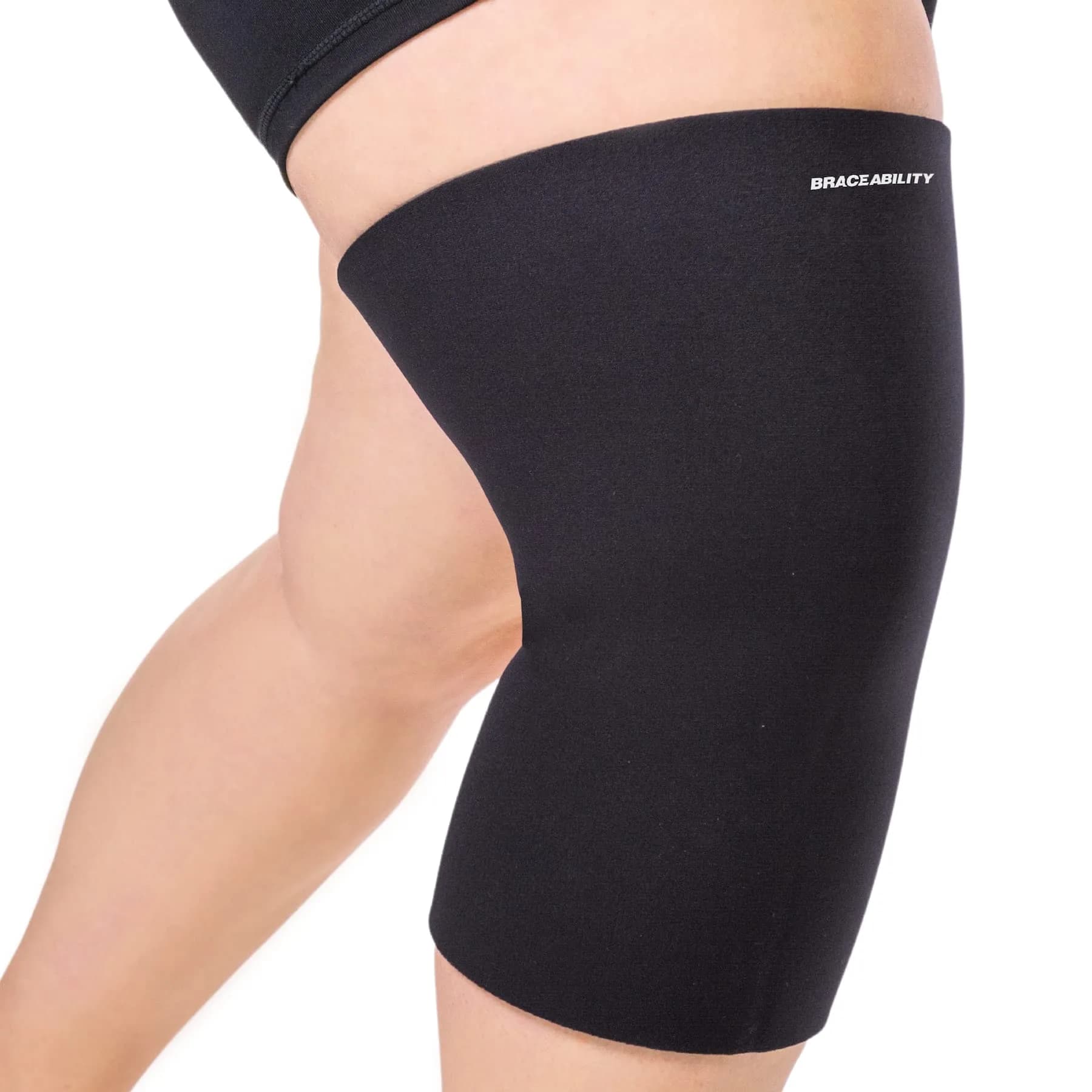 BraceAbility Plus Size Knee Sleeve 3X-Large Wide | Orthopedic Brace for Arthritis Joint Pain — Black / 4X-Large