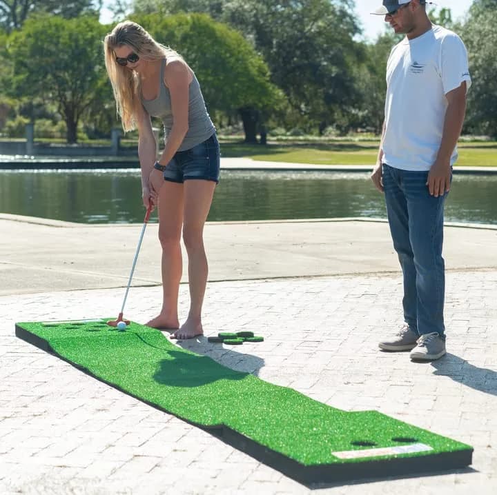 PutterBall Original Golf Putting Game Set – Backyard 12 ft Putting Green Pong Style Golf Mat with 2 Putters, 2 Balls & Hole Covers thumbnail 7