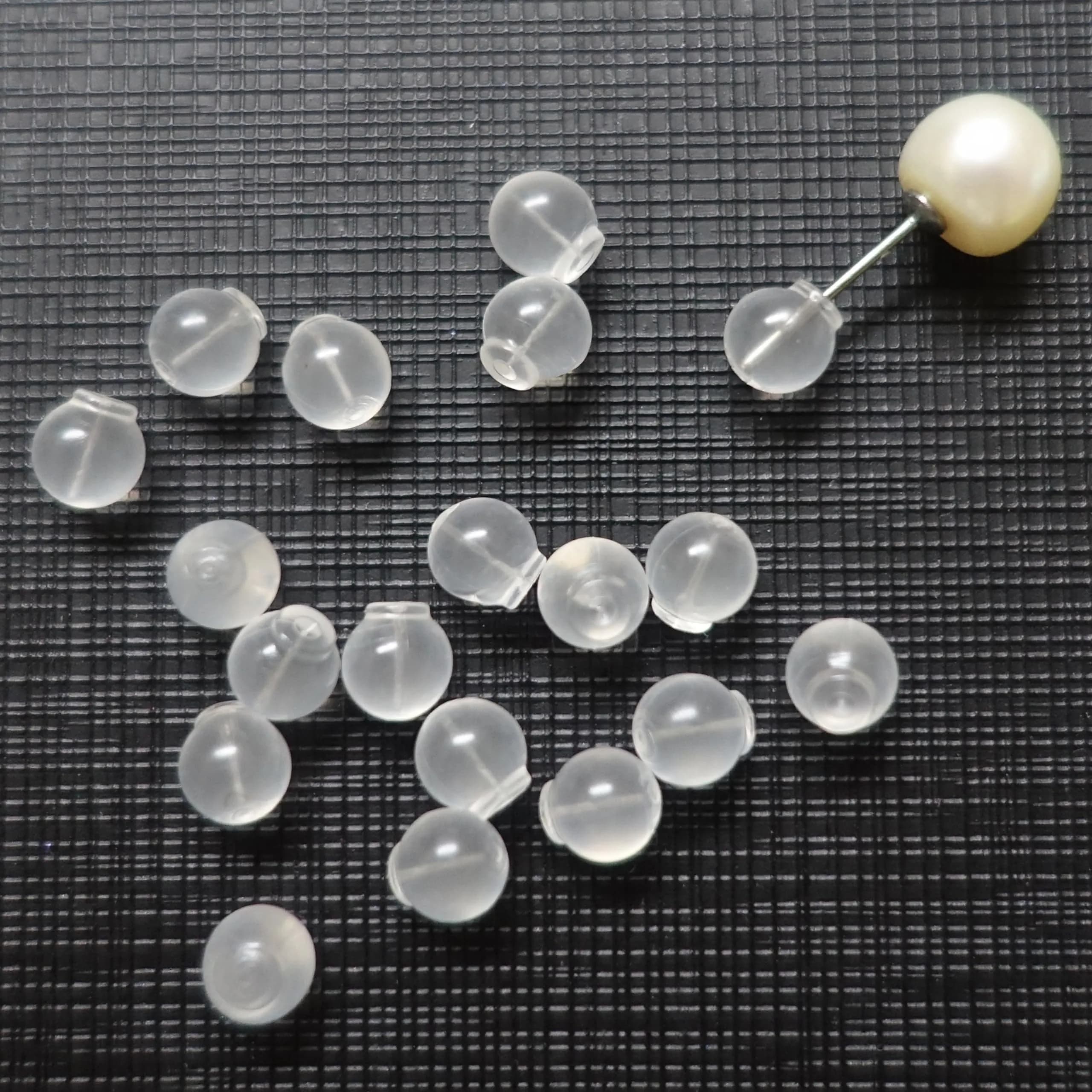 OwlkOrmy Clear 102pcs Comfort Impenetrable Soft Safety Earring Backs | TPE Medical Grade Material - main product image