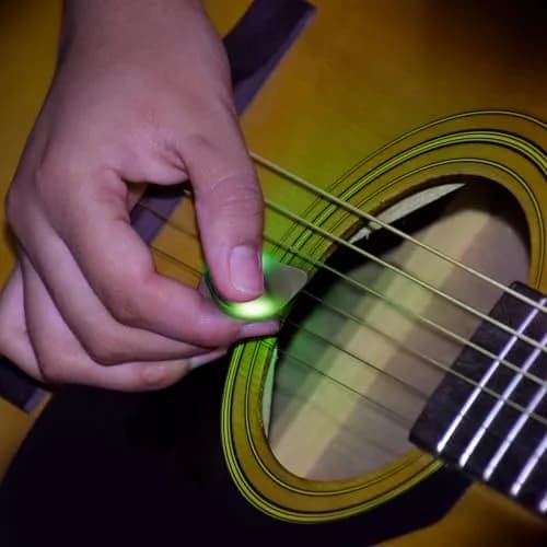 tiaotyu Auto LED Glowing Guitar Picks 0.6mm | Replaceable Battery, Dazzling Light Show for Guitarists thumbnail 4